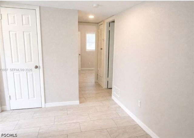 1104 E Jasmine RD, Lehigh Acres, FL 33936