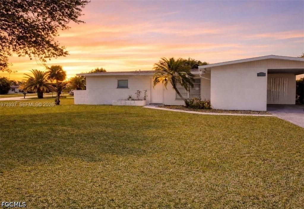 1104 E Jasmine RD, Lehigh Acres, FL 33936