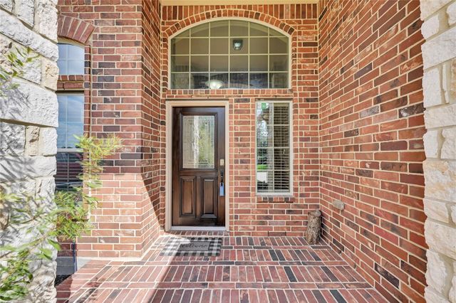 20254 Fossil Valley Lane, Cypress, TX 77433