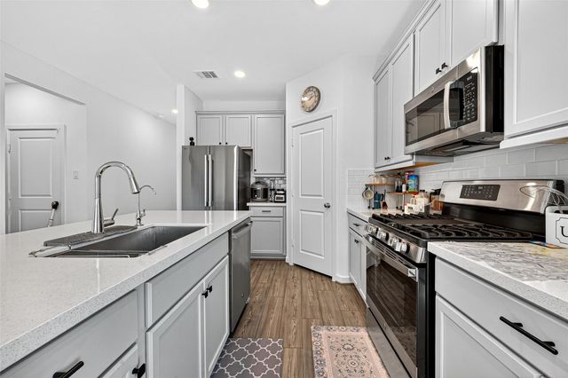 9703 Arrigoni Creek Drive, Cypress, TX 77433