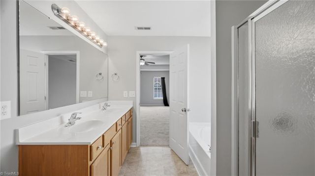 2016 Heron Pointe Drive, Whitsett, NC 27377
