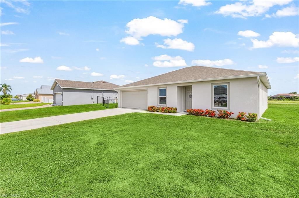 127 NW 10th TER, CAPE CORAL, FL 33993 — exterior