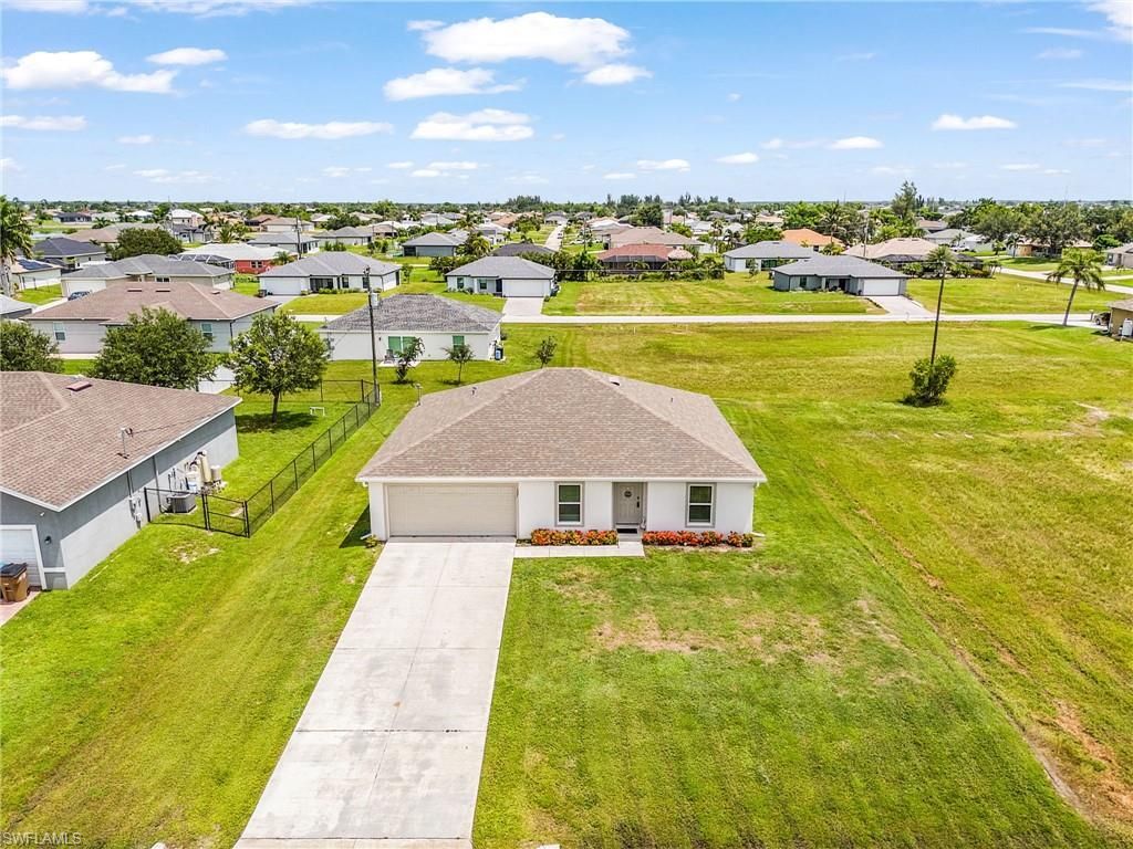 127 NW 10th TER, CAPE CORAL, FL 33993 — photo 2
