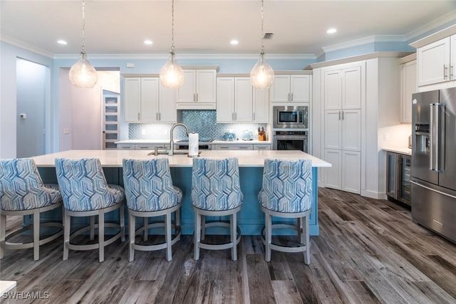 8754 Calypso CT, Naples, FL 34112