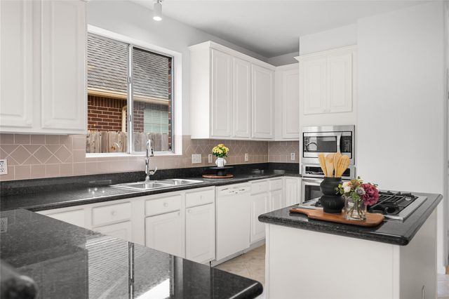9022 Memorial Creek Drive, Spring, TX 77379