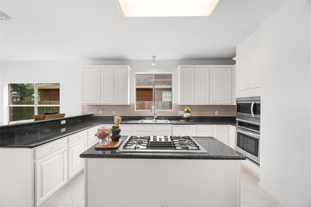 9022 Memorial Creek Drive, Spring, TX 77379