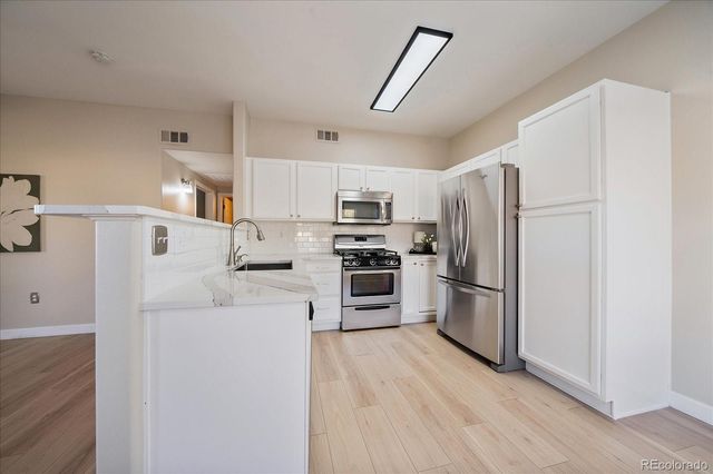 8655 W Berry Avenue 104, Littleton, CO 80123