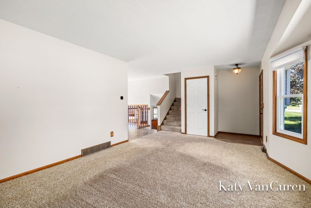 6091 Rogue River Meadows Drive Ne, Plainfield Twp, MI 49306