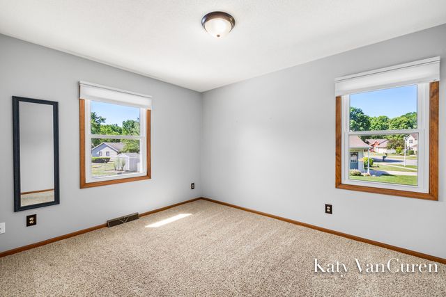 6091 Rogue River Meadows Drive Ne, Plainfield Twp, MI 49306