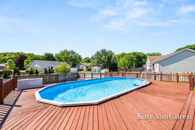 6091 Rogue River Meadows Drive Ne, Plainfield Twp, MI 49306