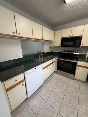 3031 Holiday Springs Boulevard 202-7, Margate, FL 33063