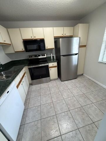 3031 Holiday Springs Boulevard 202-7, Margate, FL 33063