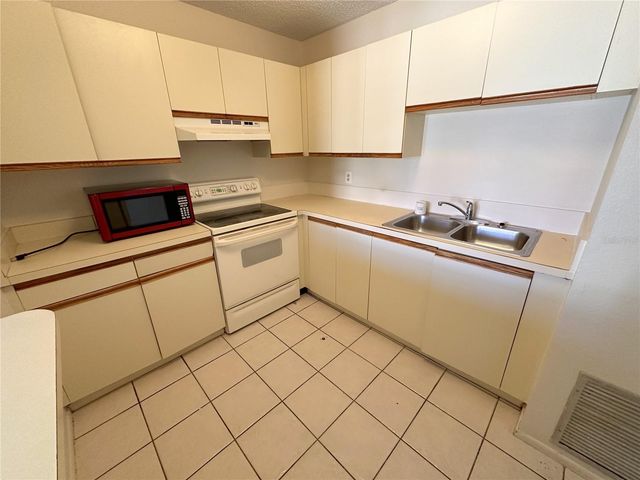 77 BOUNDARY BOULEVARD B, Rotonda West, FL 33947