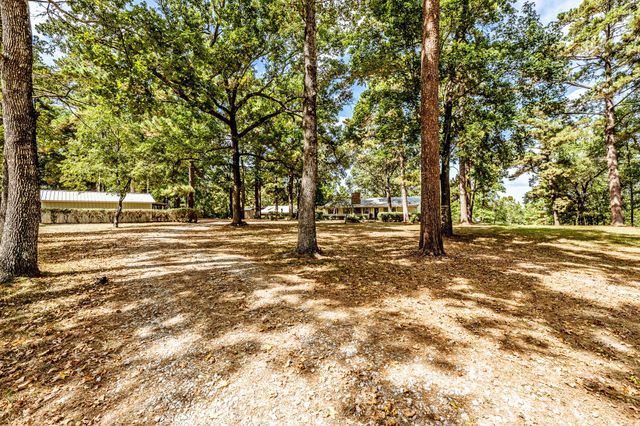 209 Raven Wood Street, Huntsville, TX 77320