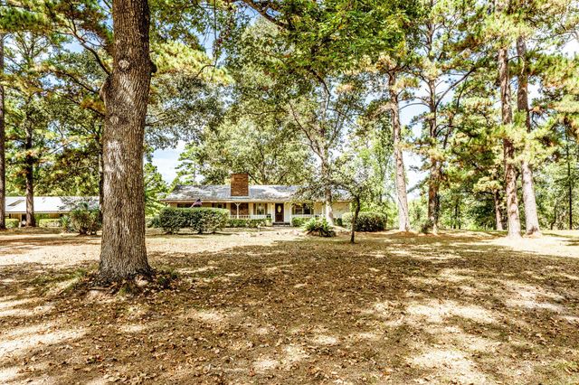 209 Raven Wood Street, Huntsville, TX 77320