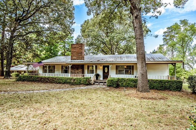 209 Raven Wood Street, Huntsville, TX 77320