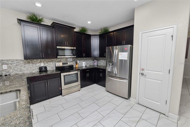 9158 SCRAMBLE DRIVE, Davenport, FL 33896