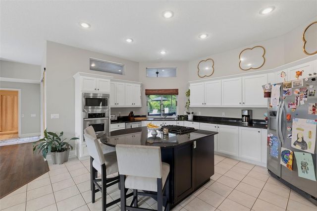 12012 BREWSTER DRIVE, Tampa, FL 33626