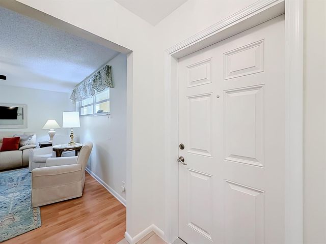 12 Colonial Club Drive 202, Boynton Beach, FL 33435