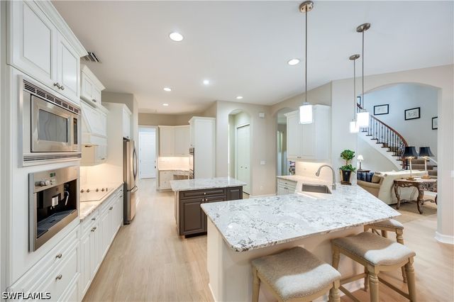 2116 Harlans RUN, Naples, FL 34105