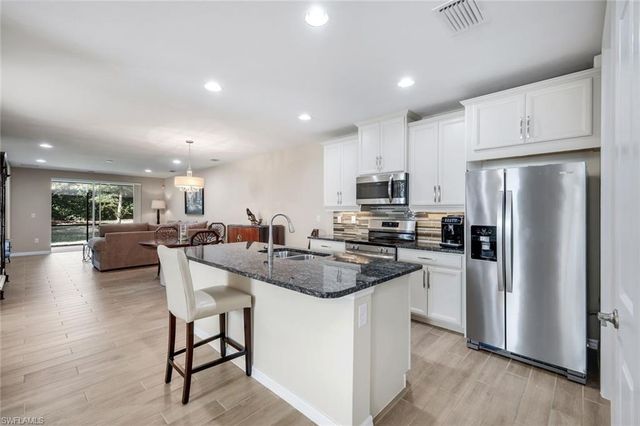 14883 Edgewater CIR, Naples, FL 34114