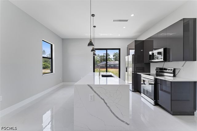 320 Long AVE S, Lehigh Acres, FL 33974