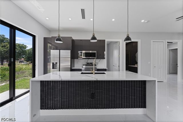 320 Long AVE S, Lehigh Acres, FL 33974