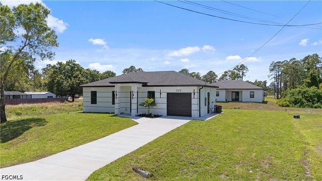 320 Long AVE S, Lehigh Acres, FL 33974