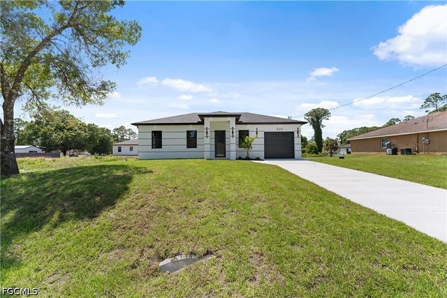 320 Long AVE S, Lehigh Acres, FL 33974