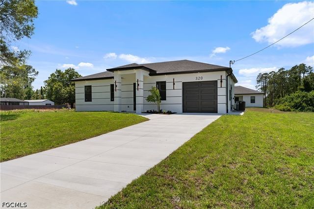 320 Long AVE S, Lehigh Acres, FL 33974