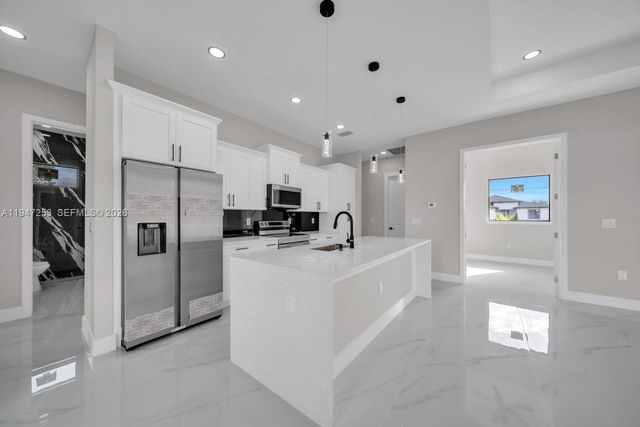 3402 15th ST SW, Lehigh Acres, FL 33976