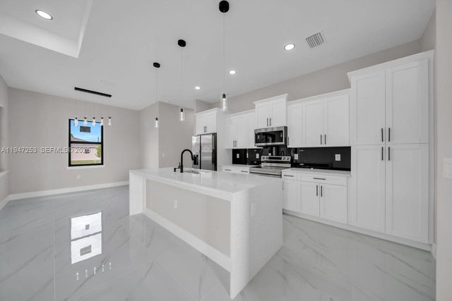 3402 15th ST SW, Lehigh Acres, FL 33976