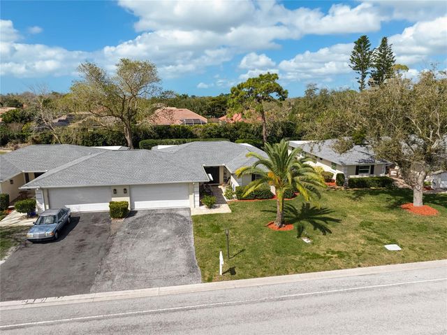 7128 W COUNTRY CLUB DRIVE N, Sarasota, FL 34243