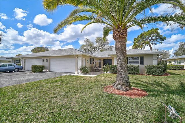 7128 W COUNTRY CLUB DRIVE N, Sarasota, FL 34243