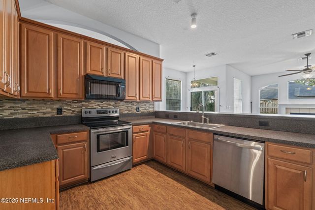 1650 MARSH WINDS Court, Fleming Island, FL 32003