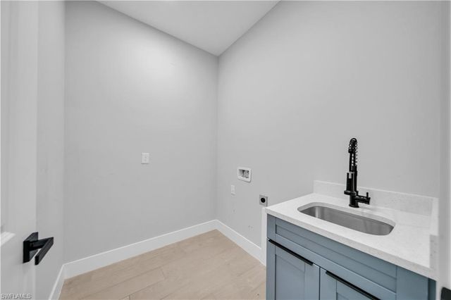 411 SW 26th PL, Cape Coral, FL 33991