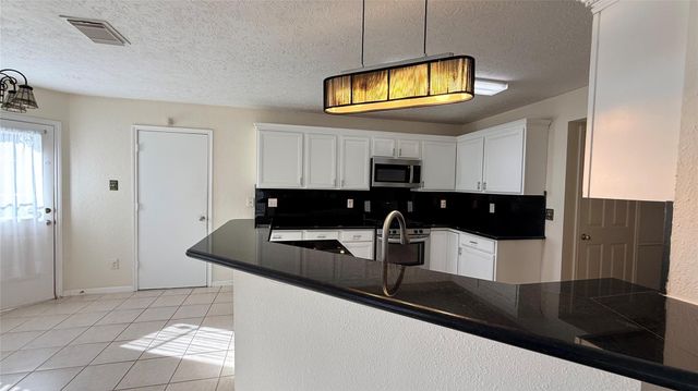 106 Crimson Bay Drive, League City, TX 77573
