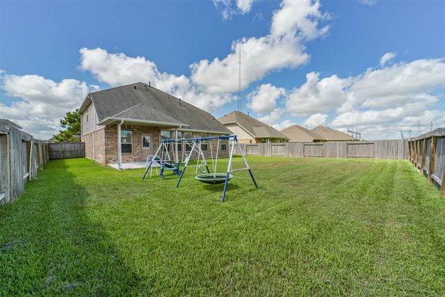 20334 Fossil Valley Lane, Cypress, TX 77433