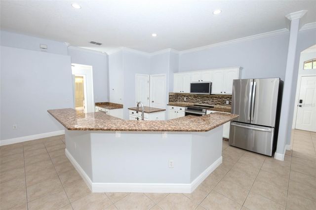 2106 THE OAKS BOULEVARD, Kissimmee, FL 34746