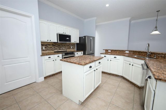 2106 THE OAKS BOULEVARD, Kissimmee, FL 34746