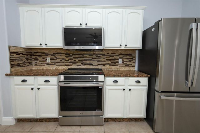 2106 THE OAKS BOULEVARD, Kissimmee, FL 34746