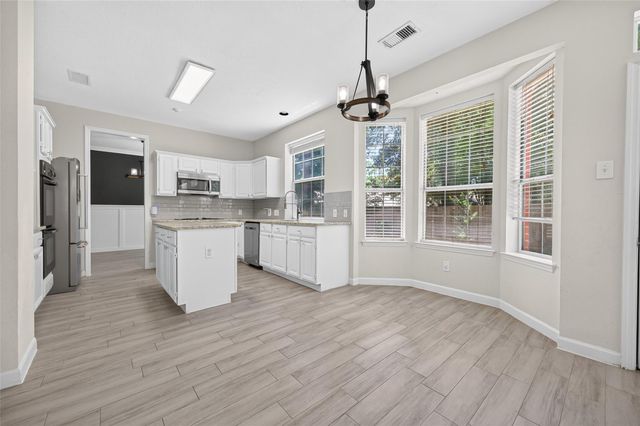 11 Ginger Bay Place, The Woodlands, TX 77382