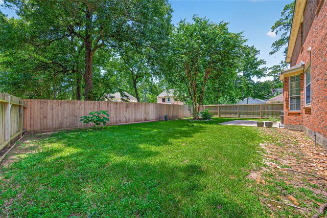 11 Ginger Bay Place, The Woodlands, TX 77382