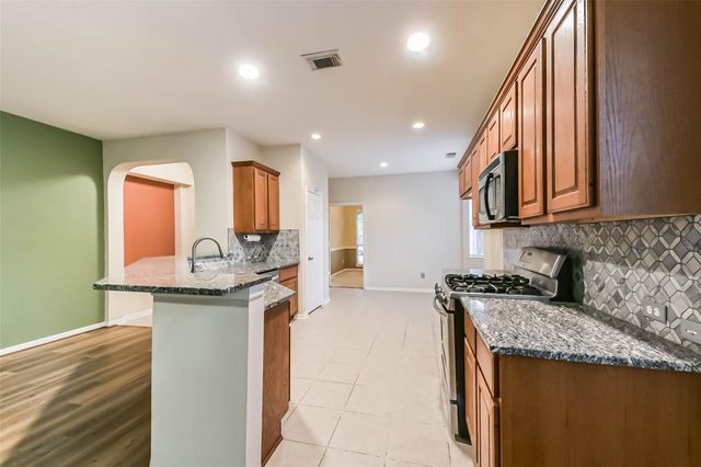14310 Eastern Redbud Lane, Houston, TX 77044