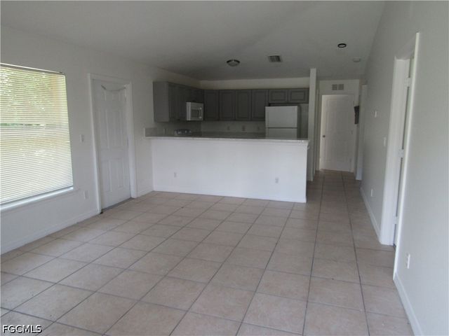 627 Meadow RD, Lehigh Acres, FL 33973