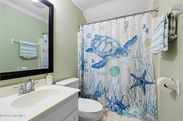 316 NE 58th Street, Oak Island, NC 28465