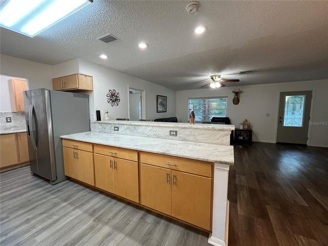 407 POINSETTIA AVENUE, Fruitland Park, FL 34731