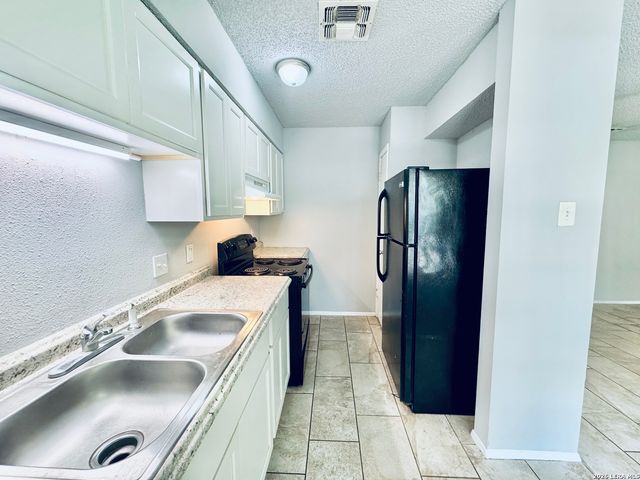 1417 W OLMOS DR, San Antonio, TX 78201