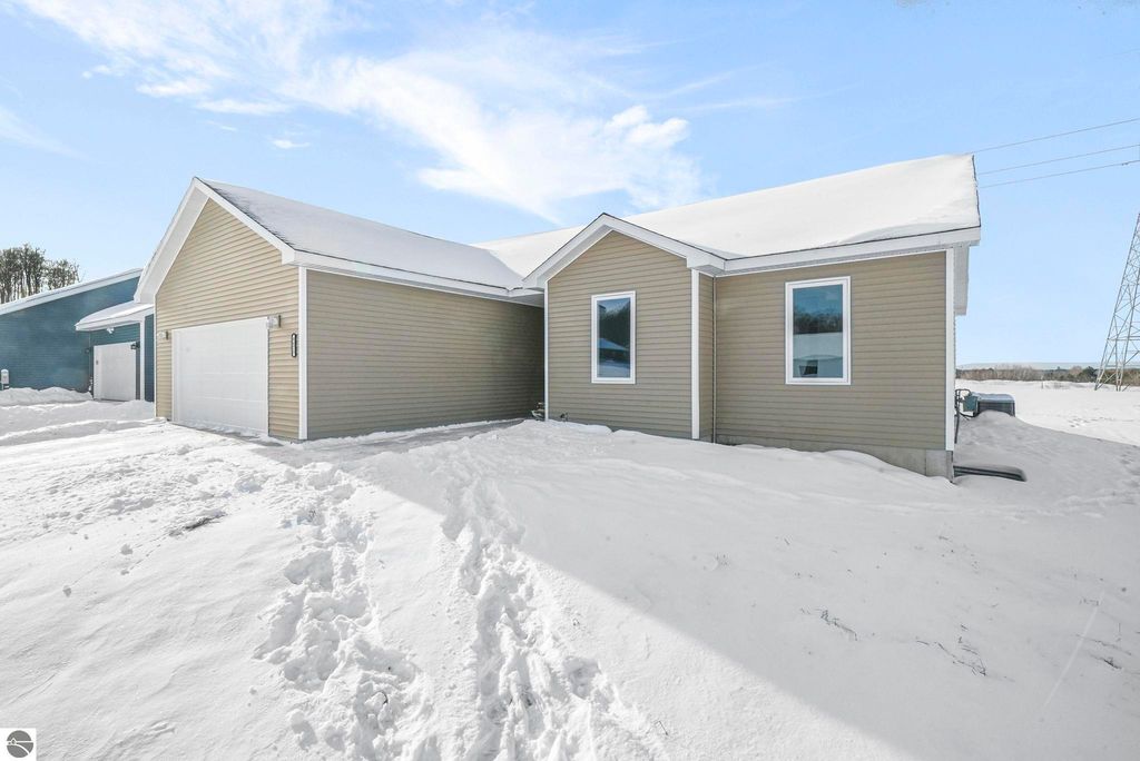 Image 1 of property listing at 4475 Edwin Boulevard, Grawn, MI 49637