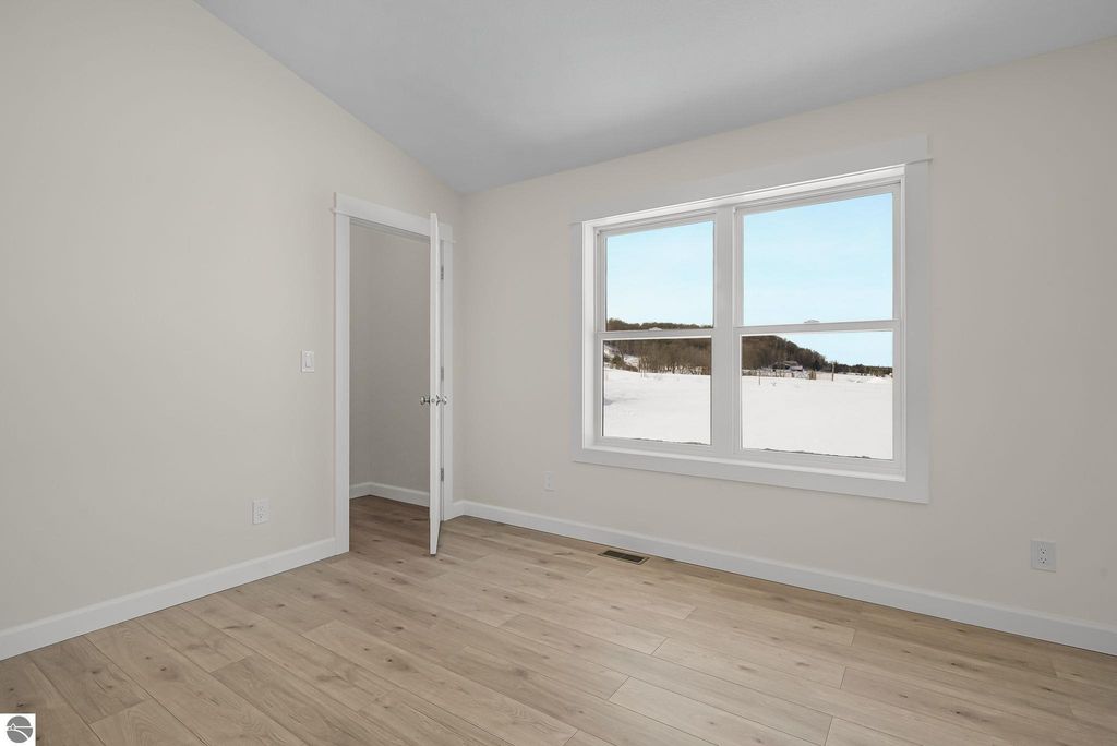 Image 10 of property listing at 4475 Edwin Boulevard, Grawn, MI 49637